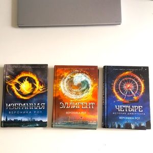 YA novels: Divergent, Allegiant, and Four